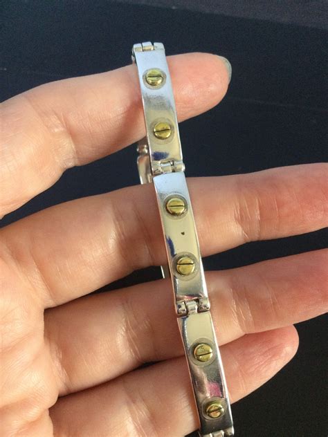 bracelet with screws - bracelet that you screw on.